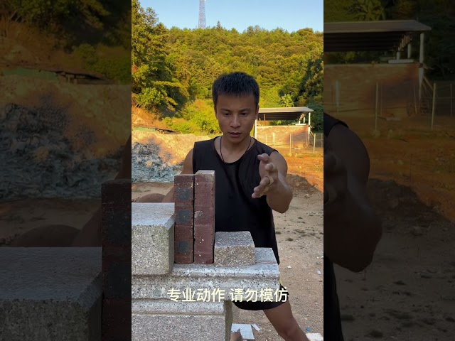 A rural Kung Fu guy breaks a brick with one finger