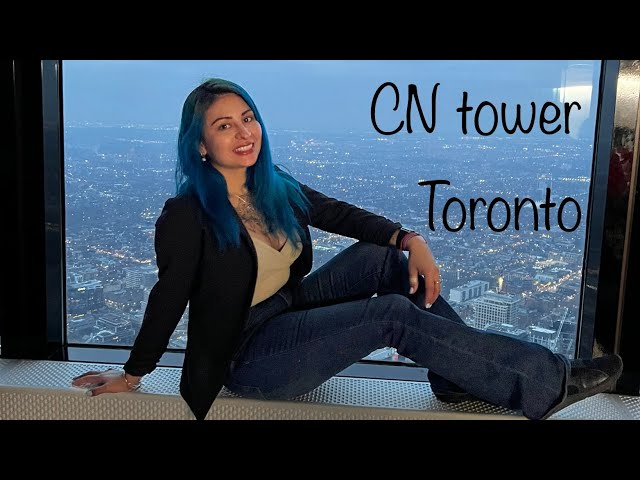 Toronto CN tower viewing from Restautant, glass floor walk around.