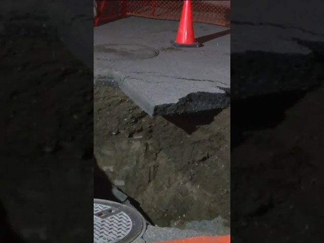 Giant sinkhole opens up in a Minneapolis street! #sinkhole #kare11 #minneapolis #shorts