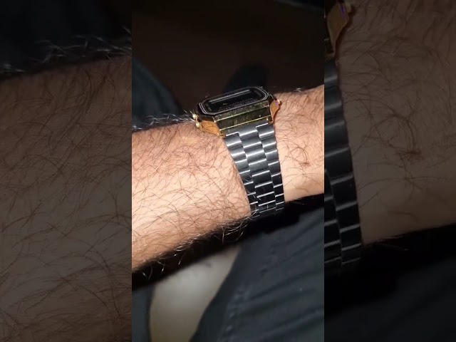 Casio 168 WE watch with gold wrap