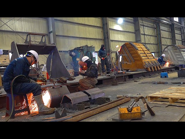Process of Making a Steel Volvo Excavator Bucket. Heavy Equipment Factory in Korea.
