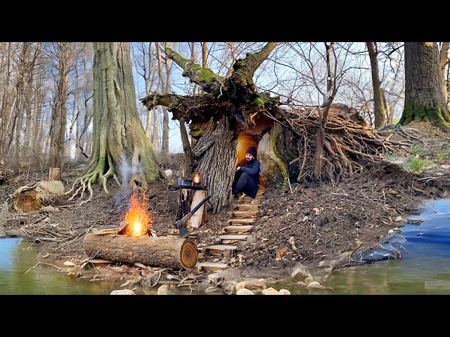 Building a secret shelter inside a fallen tree near a mystical lake