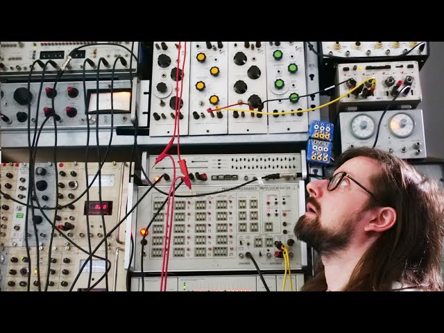 Live techno on a wall of test equipment