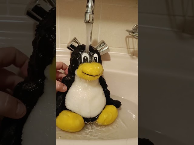 TUX taking a bath!