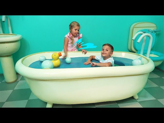 Diana and Roma fun play at the theme park Peppa Pig