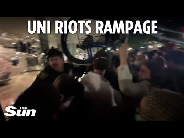 Moment desperate cops push back violent rioters with a BICYCLE during university Gaza protest