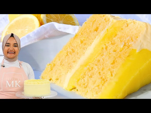 I made my moist LEMON CAKE recipe even better! Soft, zesty lemon cake with lemon curd