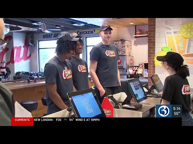 UConn players work 'shift' at Raising Cane's