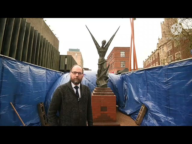 Councillor Welsh at The Phoenix statue in Bull Yard