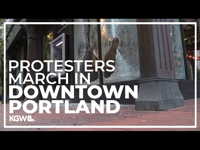 Pro-Palestinian protesters march in downtown Portland, break windows at Pioneer Courthouse Square
