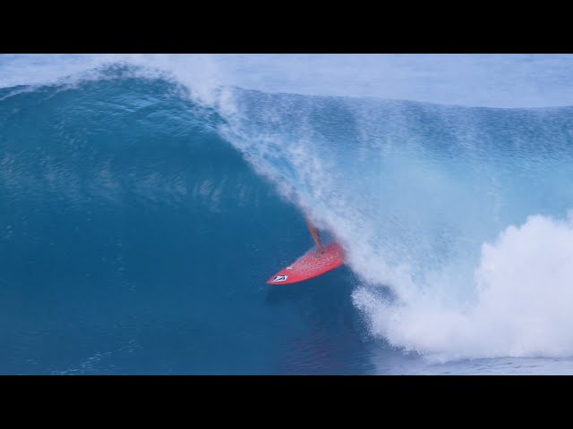 Slow Motion Perfection: Surfers Getting Barrelled during a surf contest.