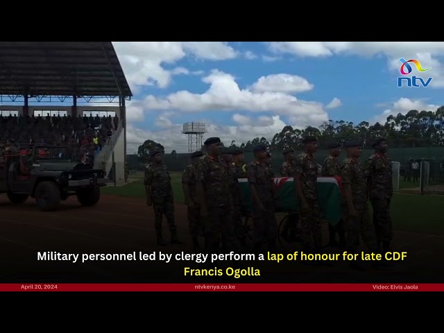 Military personnel led by clergy perform a lap of honour for late CDF Francis Ogolla