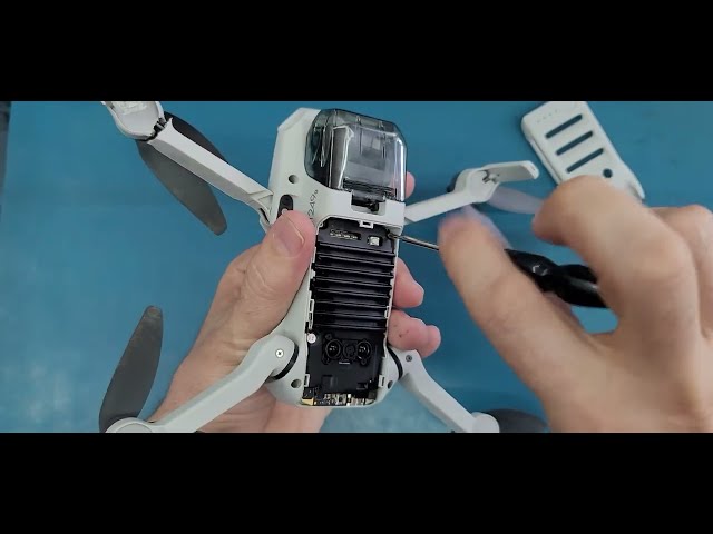 How to replace the right front arm on DJI  MINI 2 step by step.