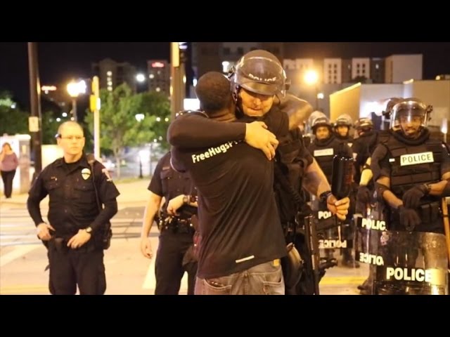 Man Faces Backlash For Hugging Officers In Riot Gear During Charlotte Protests