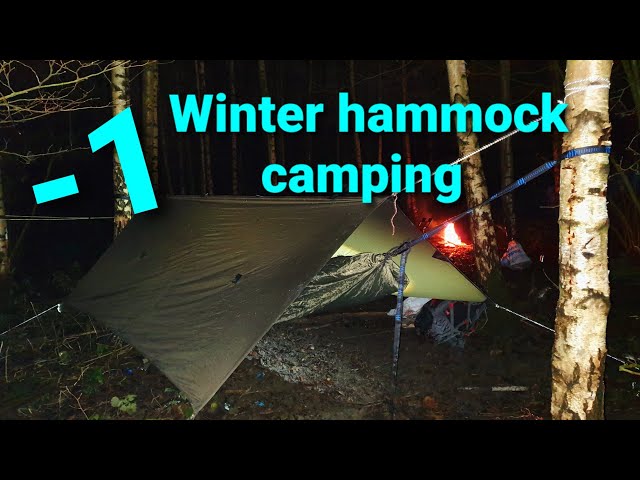Winter hammock camping in Heavy overnight rainfall and cold temperatures.