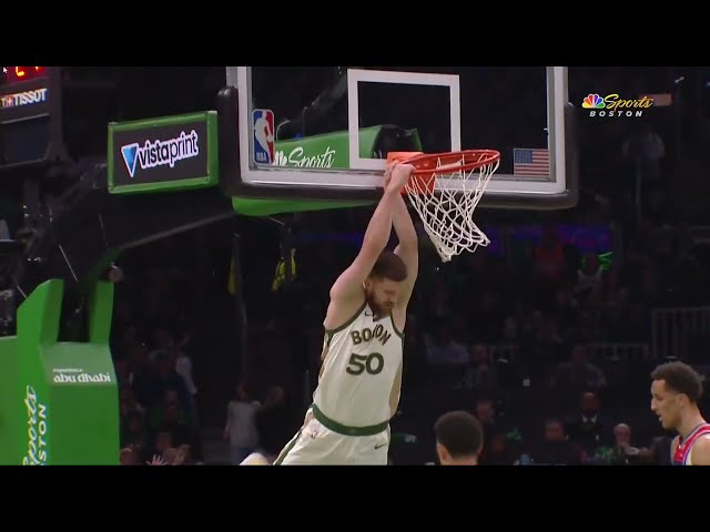 Svi Mykhailiuk soars for an alley oop dunk and the bench goes wild