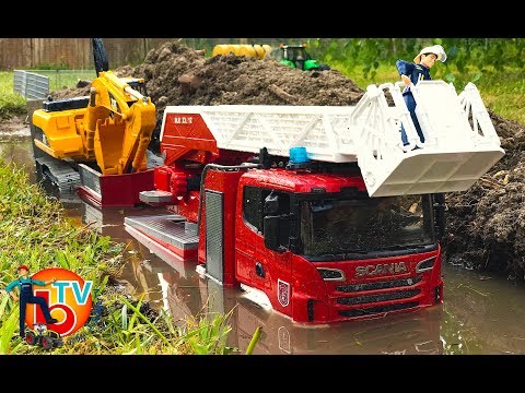 BRUDER Truck SCANIA FIRE engine Brandbil with CAT Excavator | Kids videos