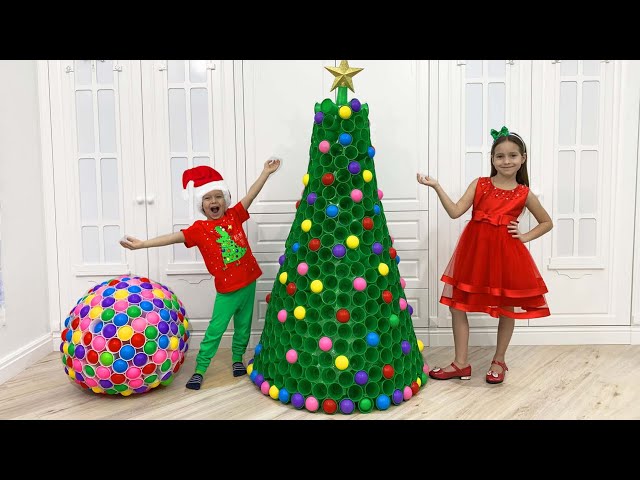 Sofia and Max are decorating the Christmas tree with colored balls! Fun story for kids