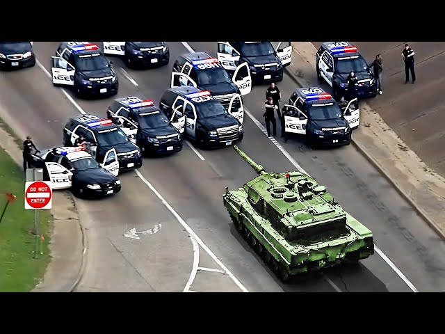 Cops try to stop tank. Then this happens...