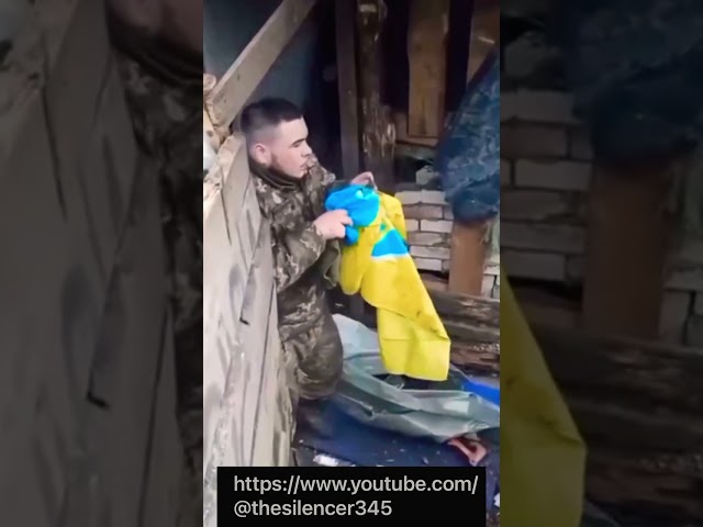 Russian Soldiers abusing a Ukrainian Defender- They make him dance and fire rounds at him 🤬🤬🤬