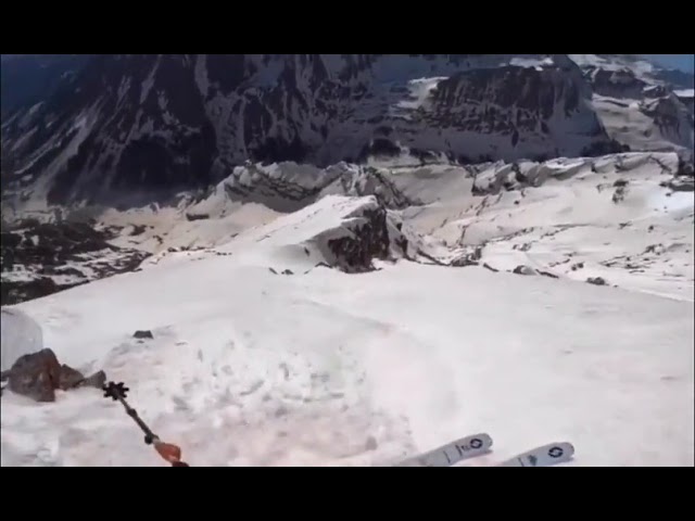 Skier snags a rock trying to ski down a 1000 ft slope in Aspen, CO