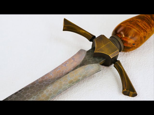 Dragonhide Damascus quillon dagger from bearing steel balls