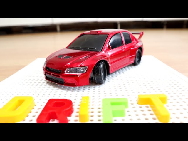 Low Cost Mitsubishi EVO 7 'HOBBY GRADE' Beginner RC Drift Car Review - Unboxing, Details & Drifting