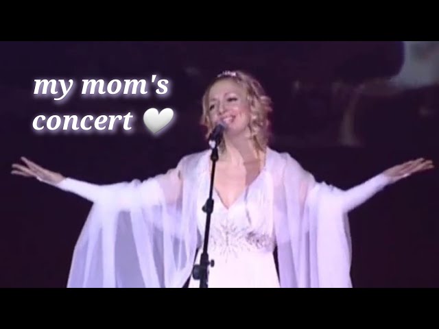 my mom singing at a concert 12 years ago (2011)