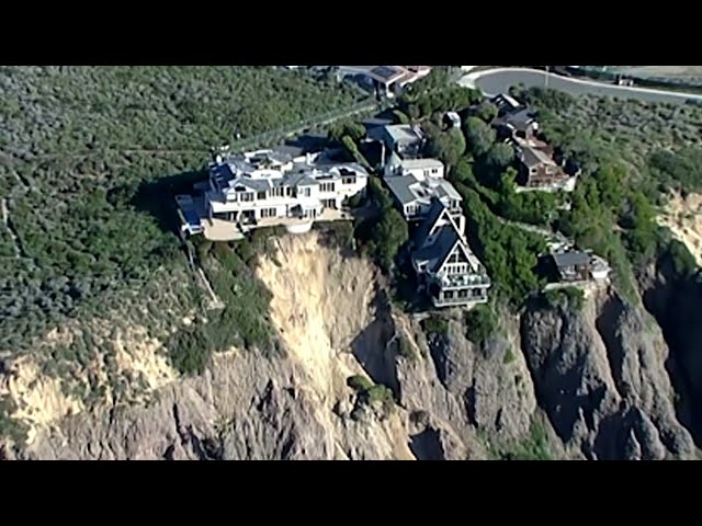 Luxury mansions teeter on cliff edge after landslides in California