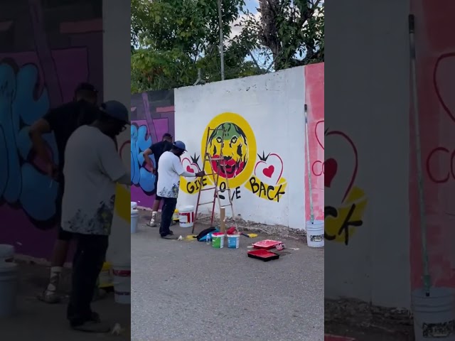 The Give Love Back Worldwide Foundation painting murals throughout Grants Pen, Kingston 🇯🇲 #Shorts