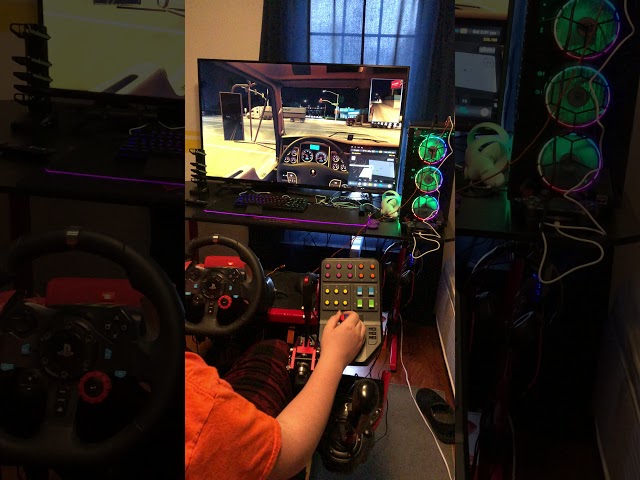 My son playing ATS with Logitech G29 wheel.. pedals and side panel with Eaton Fuller SKS shifter