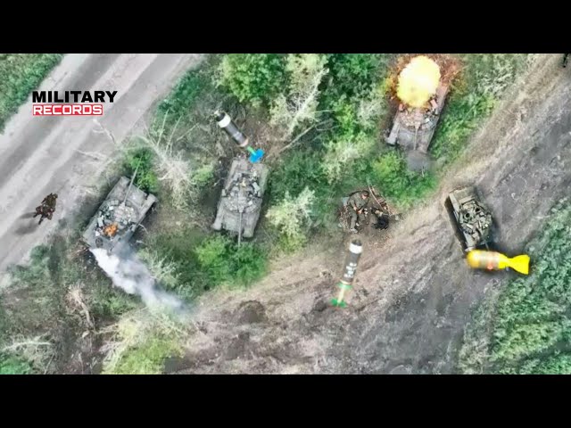 Horrible Footage! Drone Ukrainian dropping bombs to whole column russia armoured vehicles in Kherson