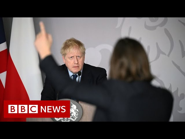 UK PM Boris Johnson confronted by tearful Ukrainian - BBC News
