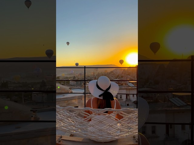 When you find the perfect rooftop patio to watch the Cappadocia hot air balloons.