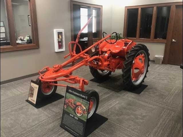 Eastern Iowa Ag Lender Displays Antique Tractors in Bank Lobby