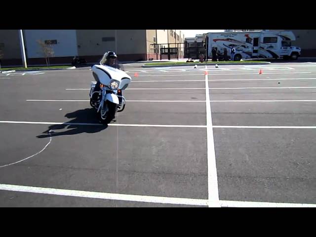 Zooming through the Motorcycle Training Course on a Harley - Go Donna!