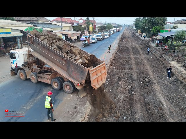 Huge Rock unLoading In Deep Foundation Of Road Expansion With Shantui SD16 Dozer & Dump Trucks Heavy