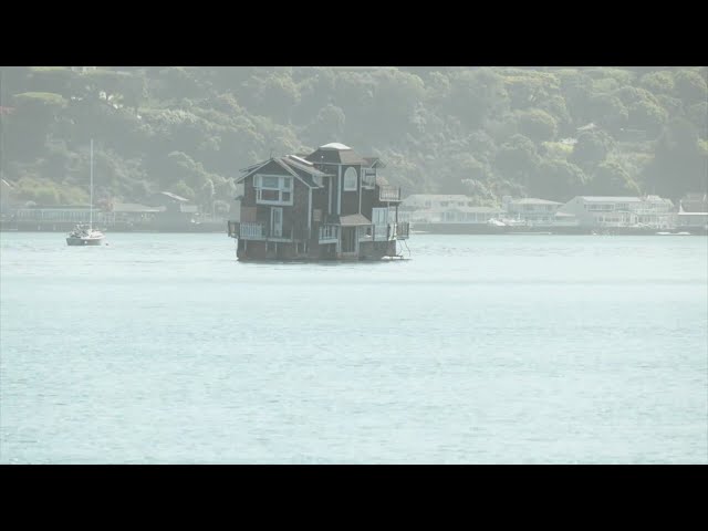 Why is a house floating across the San Francisco Bay?