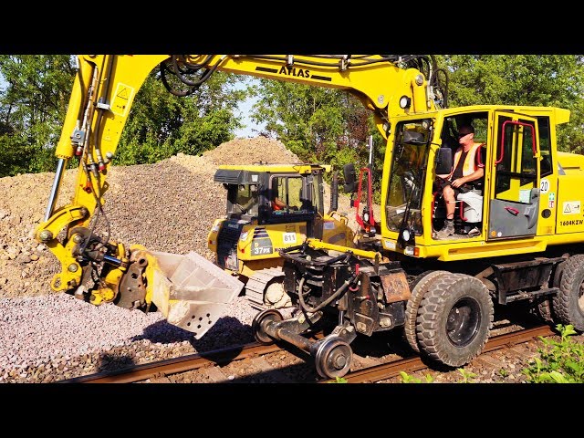 Railroad Trackbed Construction with Bulldozer and Excavator