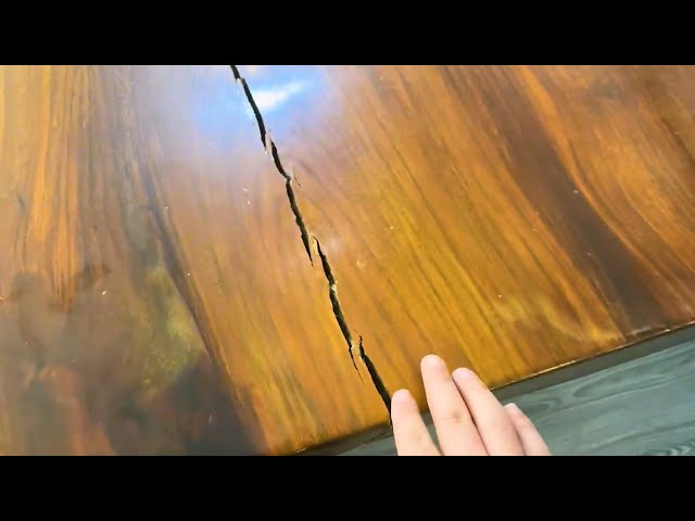 A 70 centimeter long crack split the 3 meter long desk in half, 502 glue to solve it perfectly