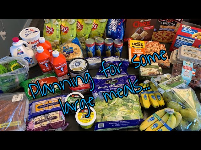 Grocery Haul And Tourist Traffic - Large Family Living