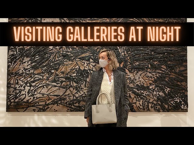 Visiting art galleries in New York City in the Chelsea neighborhood at night...