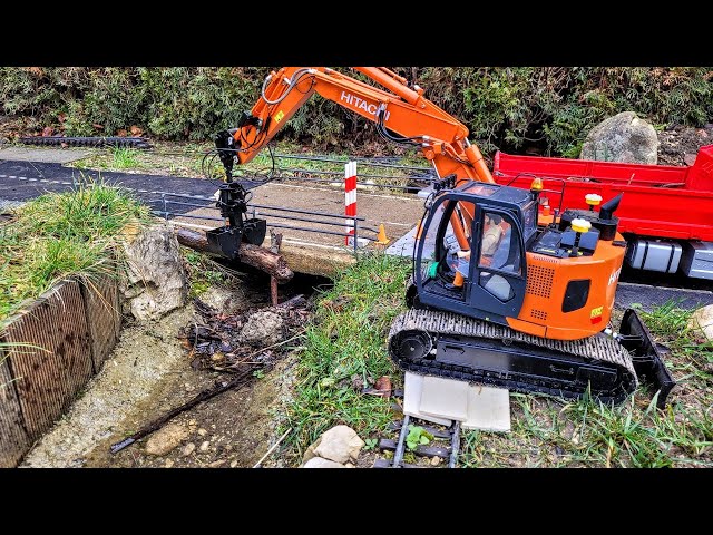 RC Excavator river cleaning after storm. Hitachi ZX135, MAN TGS 1/15 Scale models