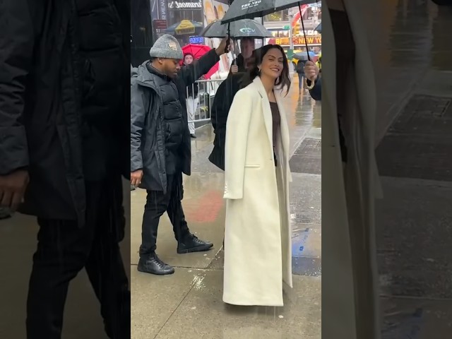 Camila Mendes keeps her composure for fashion pics right through the pouring rain! #camilamendes