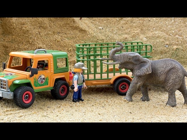 Распаковка игрушек Грузовик и Слон