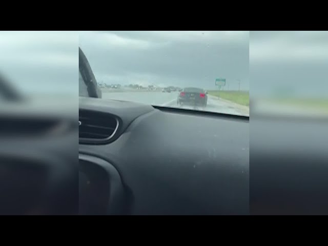RAW: Mother navigates hail, spinouts on Highway 99 with daughter in car