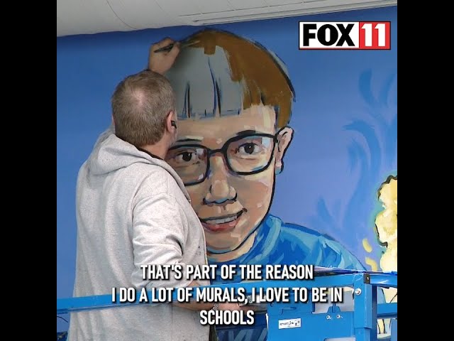Green Bay elementary students collaborate with artist on 39-foot mural