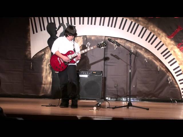 Best Guitar Solo Ever - 10 year old Stefanos rips through Eruption live