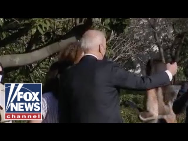 Biden snaps selfie on way to Camp David as Russian invasion looms