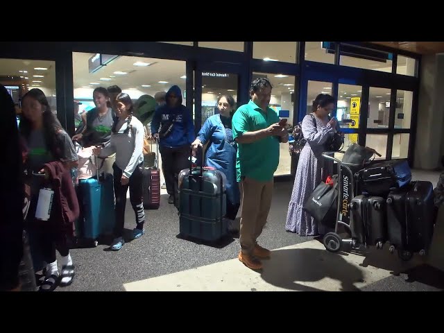 Stranded after the Maui fires, Honolulu's airport is inundated with both residents and visitors